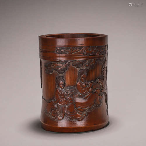 A figure carved bamboo brush pot