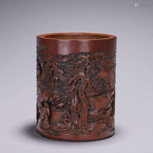 A figure carved bamboo brush pot