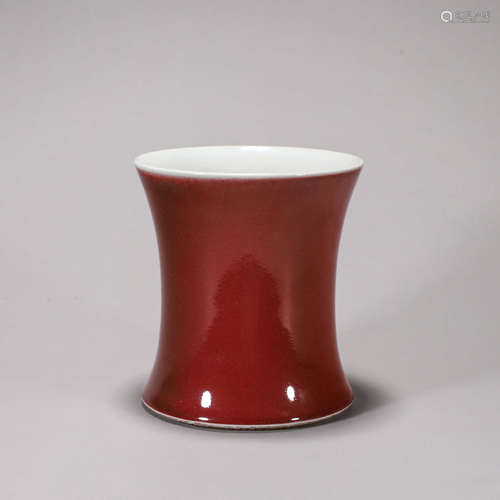 A red glazed porcelain zun