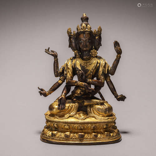 A gilding copper eight-armed Guanyin bodhisattva statue