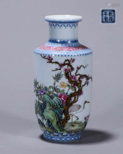 An enamel bird and flower porcelain vase