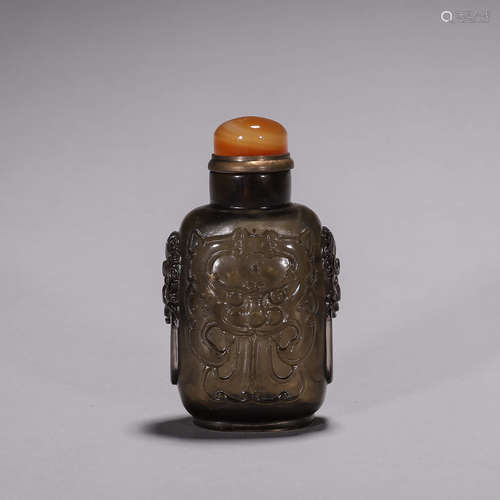 A taotie crystal snuff bottle