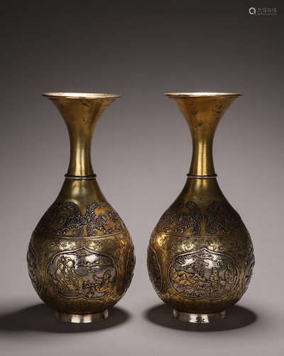 A pair of figure patterned gilding copper vases