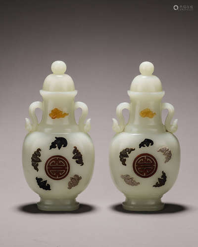 A pair of bat and beast Hetian jade vases