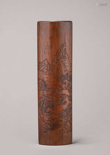 A landscape carved bamboo arm rest