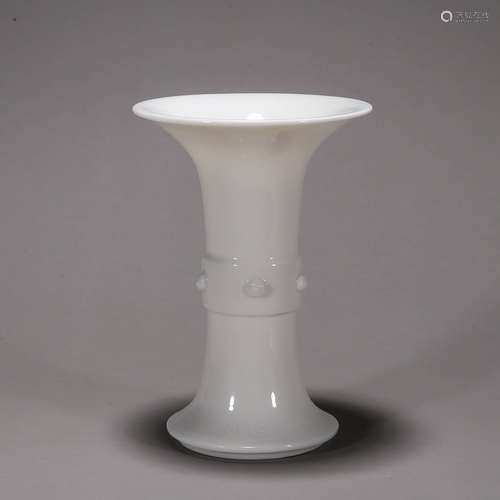 A white glazed porcelain beaker vase