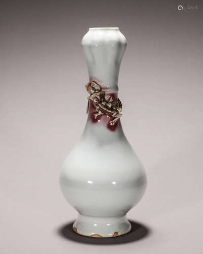 A white glazed porcelain vase