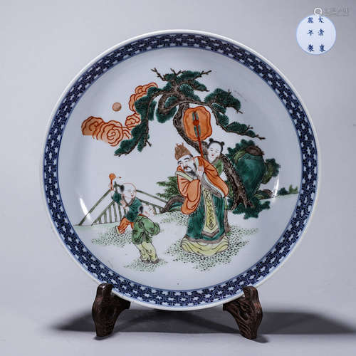 A blue and white multicolored figure and dragon porcelain pl...