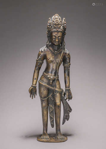 A silver-inlaid copper Guanyin bodhisattva statue