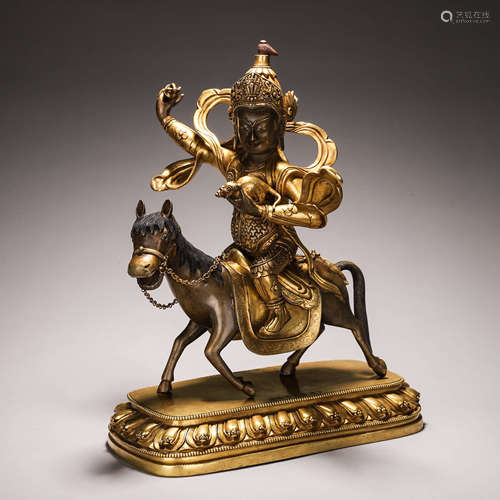 A gilding copper buddha statue