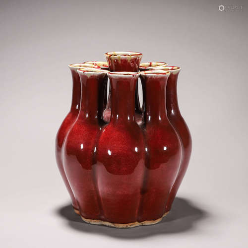 A red glazed porcelain vase