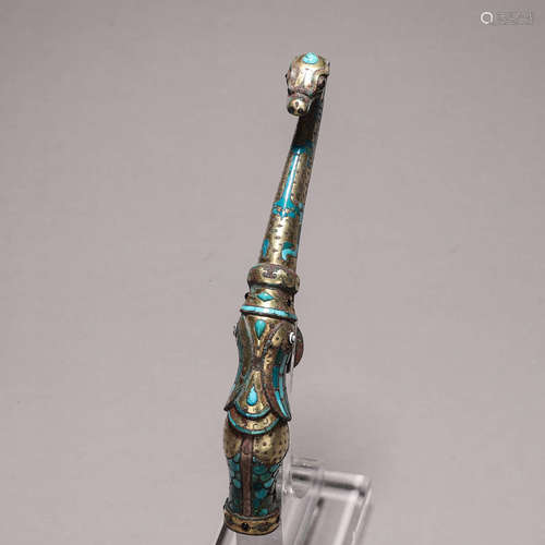 A turquoise-inlaid bronze dragon head hook