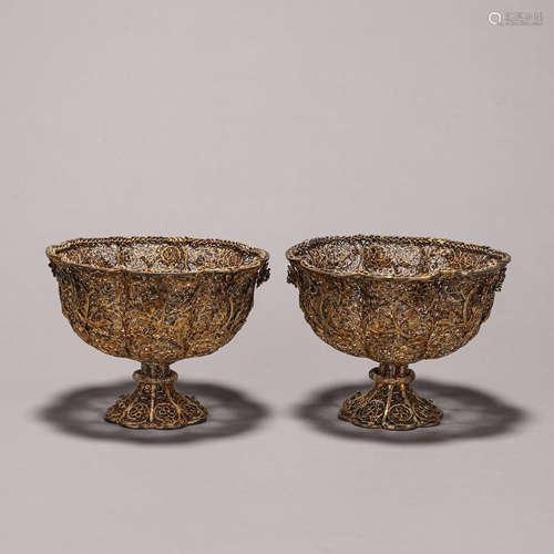 A pair of flower gilding silver cups