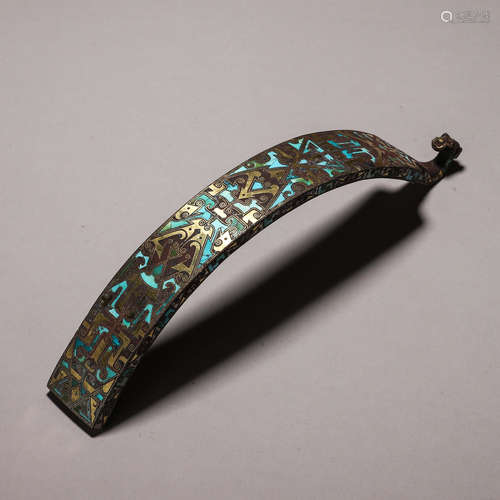 A turquoise-inlaid bronze hook