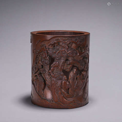 A figure carved bamboo brush pot