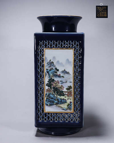 A blue glazed hollowed out landscape porcelain vase