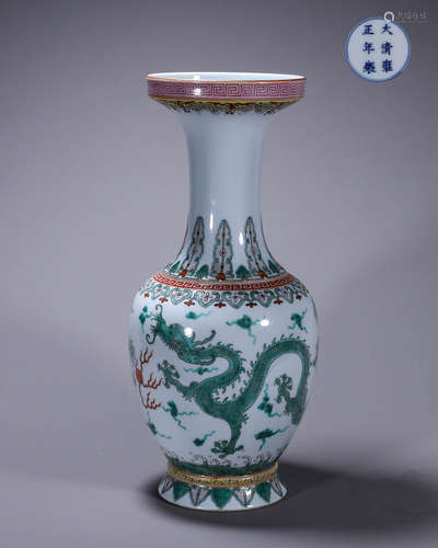 A famille rose cloud and dragon porcelain vase