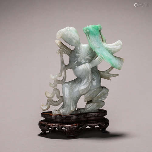 A jadeite figure ornament