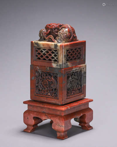 A hollowed out Shoushan soapstone lion incense burner