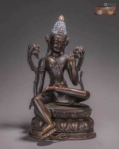 A silver-inlaid copper Guanyin bodhisattva statue