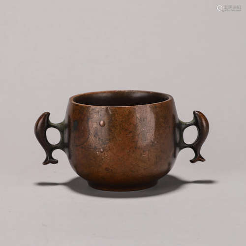 A copper censer with fish shaped ears