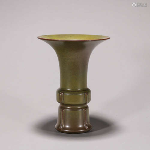 A tea dust glazed porcelain beaker vase