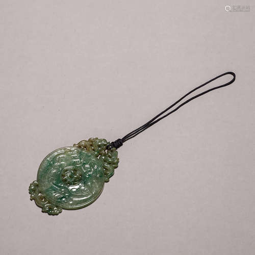 A jadeite dragon pendant