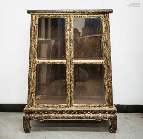 A Tibetan lacquered and gilt decorated display cabinet