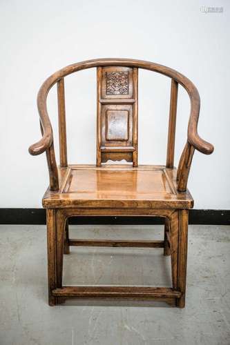 A Chinese horseshoe back armchair