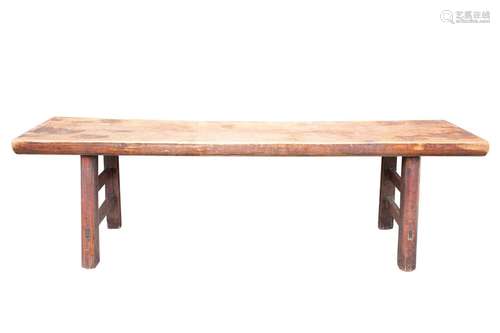 A large Thai wood bench