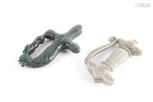 An Indian grey/ green carved jade dagger (Khanjar) handle wi...