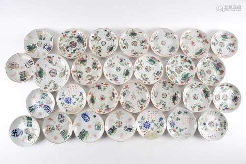 A large quantity of Chinese famille rose saucers