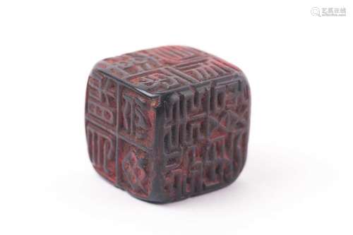 A Chinese red soapstone five sided seal