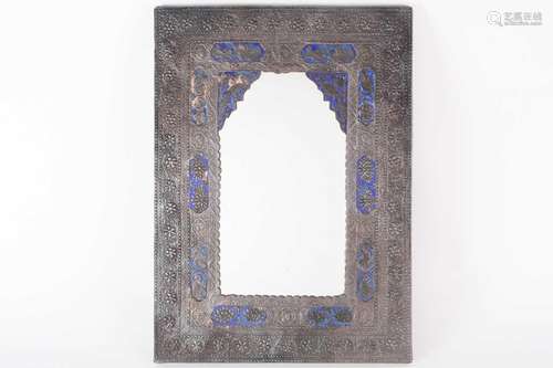 A Persian white metal mirror