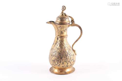 An Ottoman-style baluster form gilt brass coffee pot