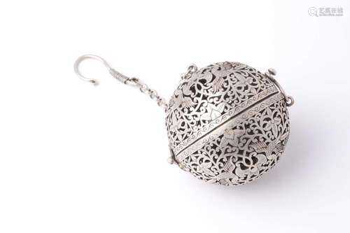 A probably Indian white metal spherical hanging pomander. Wi...