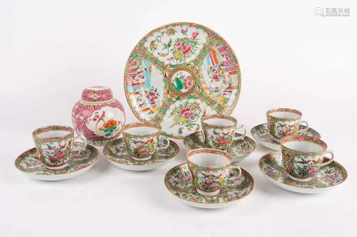 A Canton enamel Famille Rose plate and six cups and saucers