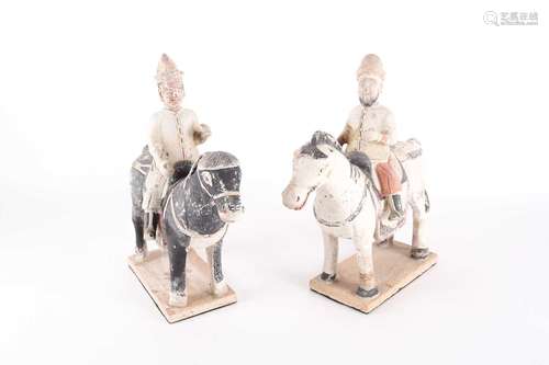 A pair of Chinese equestrian funerary figures