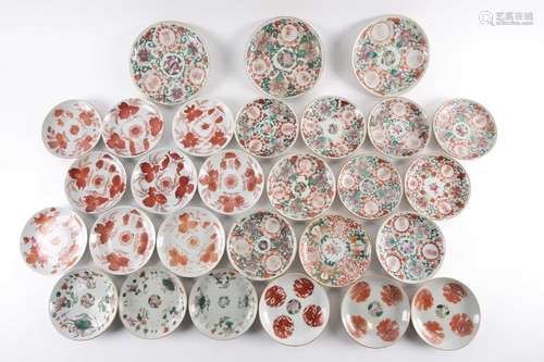 A quantity of Chinese famille rose saucers