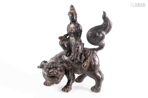 A Chinese bronze figure of Wenshu (Manjusri)