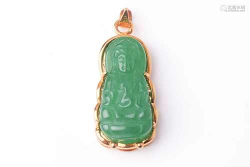 An Eastern 18ct yellow gold and carved jadeite seated Buddha...