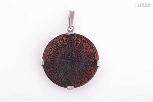 An Indo Persian dark red gem pendant