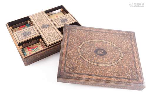 A Chinese export black and gold lacquer games box