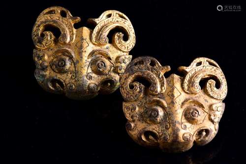 A pair of Chinese gilt cast metal Taotie furniture mounts