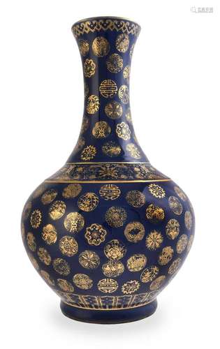 A Chinese gilt-decorated blue-ground bottle vase