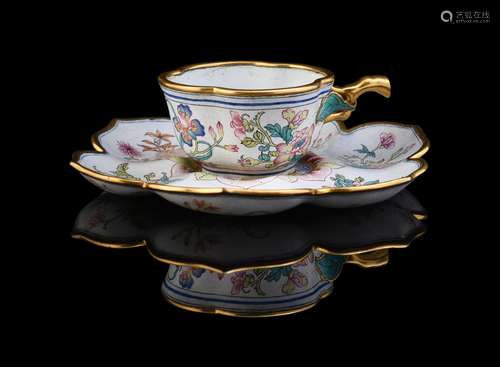 An unusual Chinese enamel cup and saucer