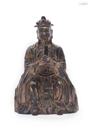 A Chinese gilt bronze and red lacquer Daoist figure of