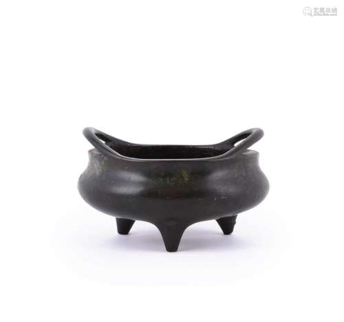 A rare Chinese bronze two-handled tripod censer