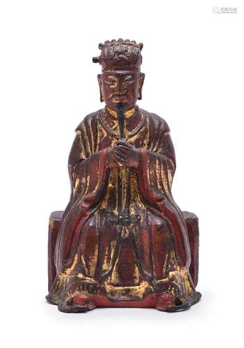 A Chinese bronze lacquered and gilt figure of a seated