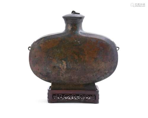 A Chinese bronze ritual wine vessel and cover
